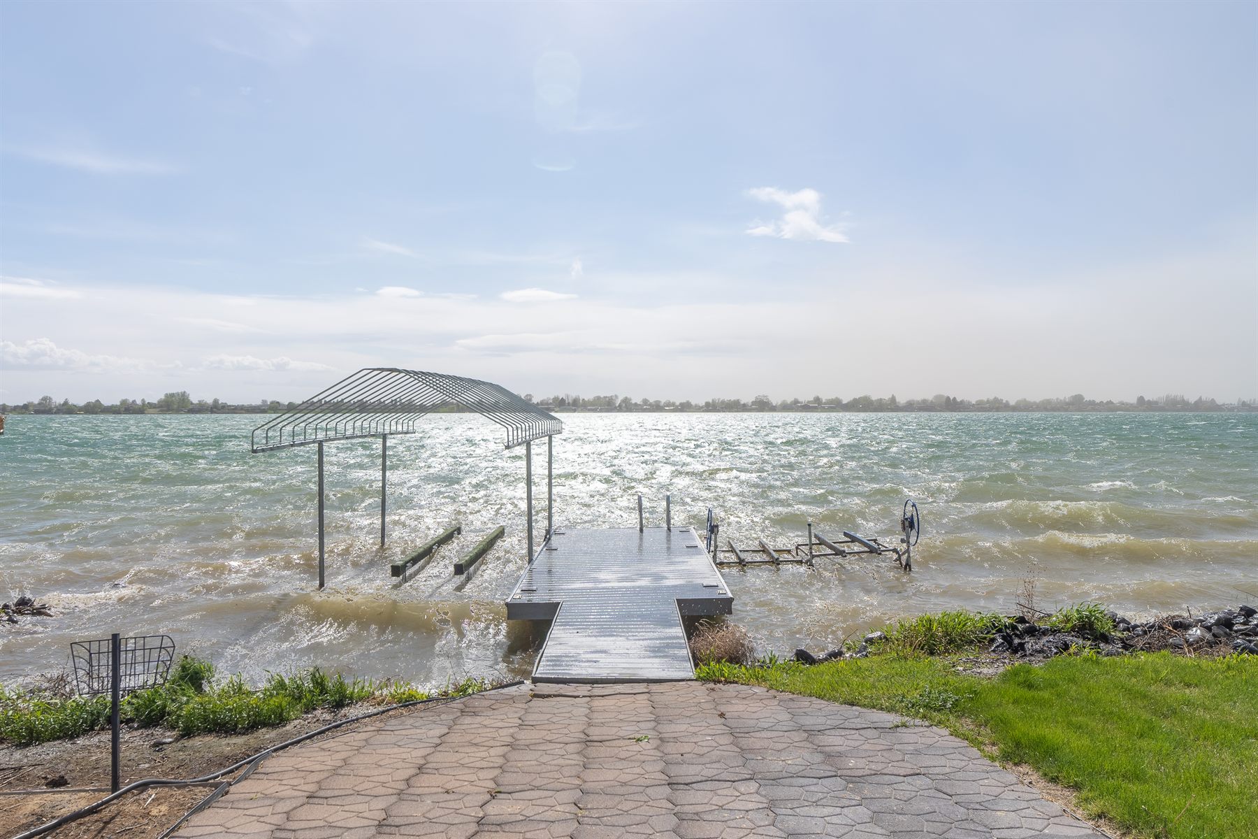 Private dock with two jet-ski lifts at Wet Feet Retreat